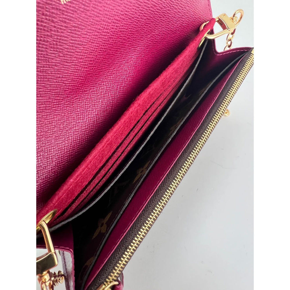 
                  
                    Louis Vuitton Emilie Monogram Fuchsia Wallet Clutch
                  
                