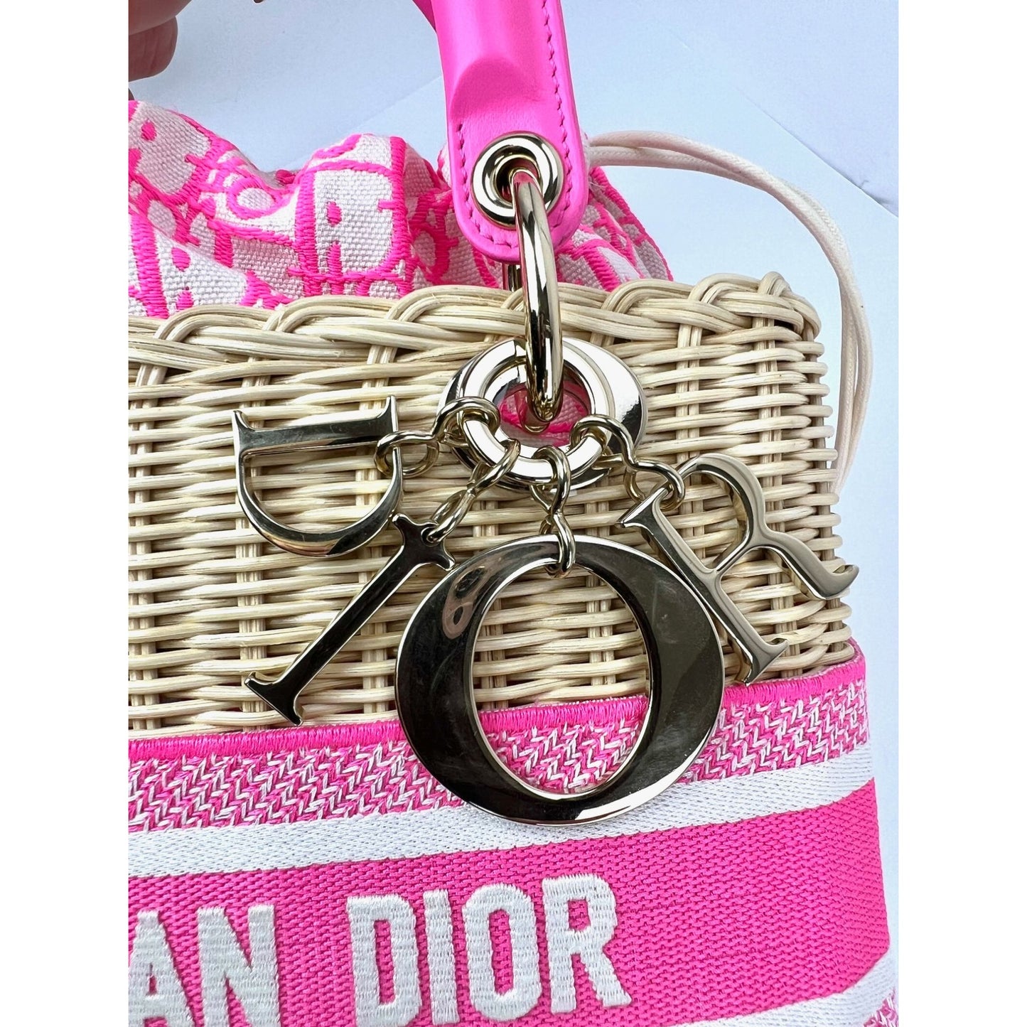 
                  
                    Christian Wicker Oblique Fluorescent Pink Medium Lady Bag
                  
                