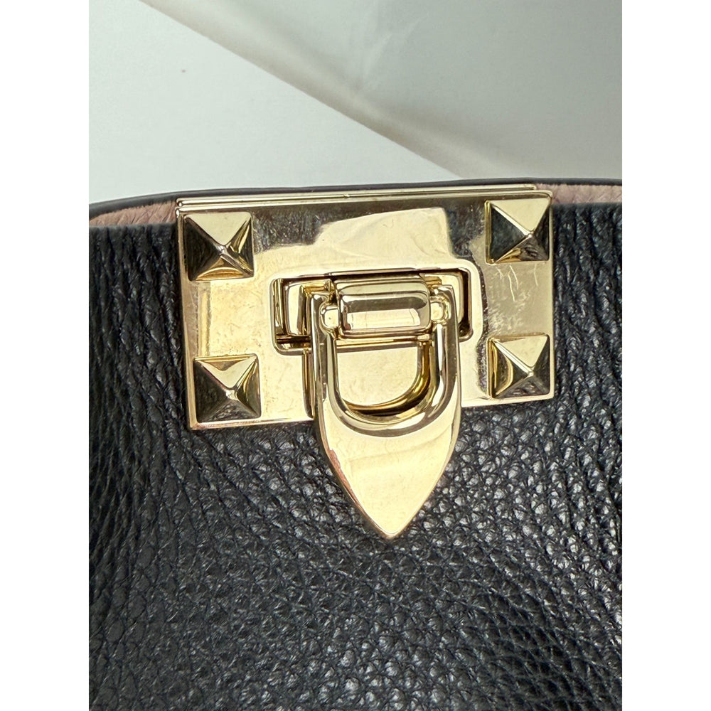 
                  
                    Valentino Giaravani Rockstud Small Black Leather Tote Bag
                  
                