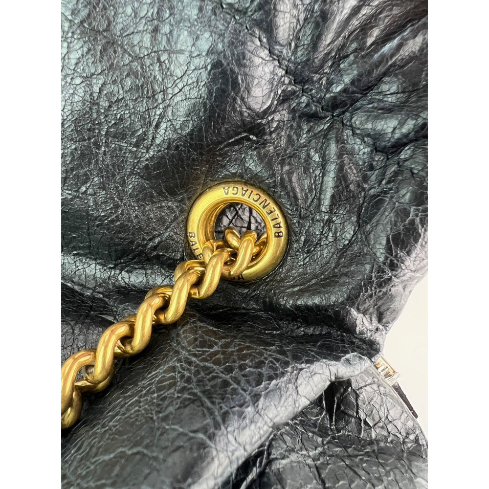 
                  
                    Balenciaga Leather Crush Medium Black Paris Charms Tote Bag
                  
                