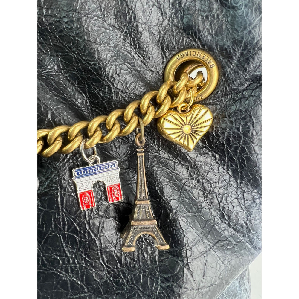 
                  
                    Balenciaga Leather Crush Medium Black Paris Charms Tote Bag
                  
                
