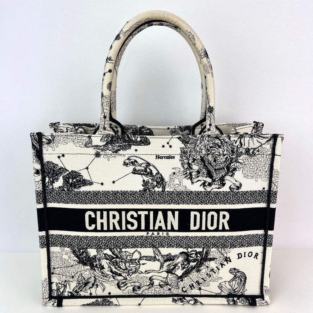 
                  
                    Christian Dior Book Embroidered Canvas Medium Stars and Signs Black Tote
                  
                