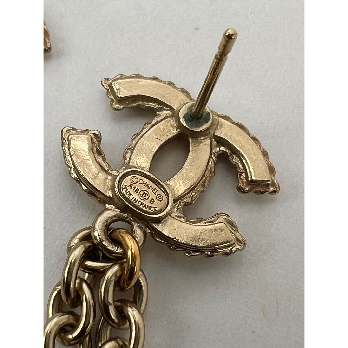 
                  
                    Chanel Gold Chain Logo Dangle CC Earrings
                  
                
