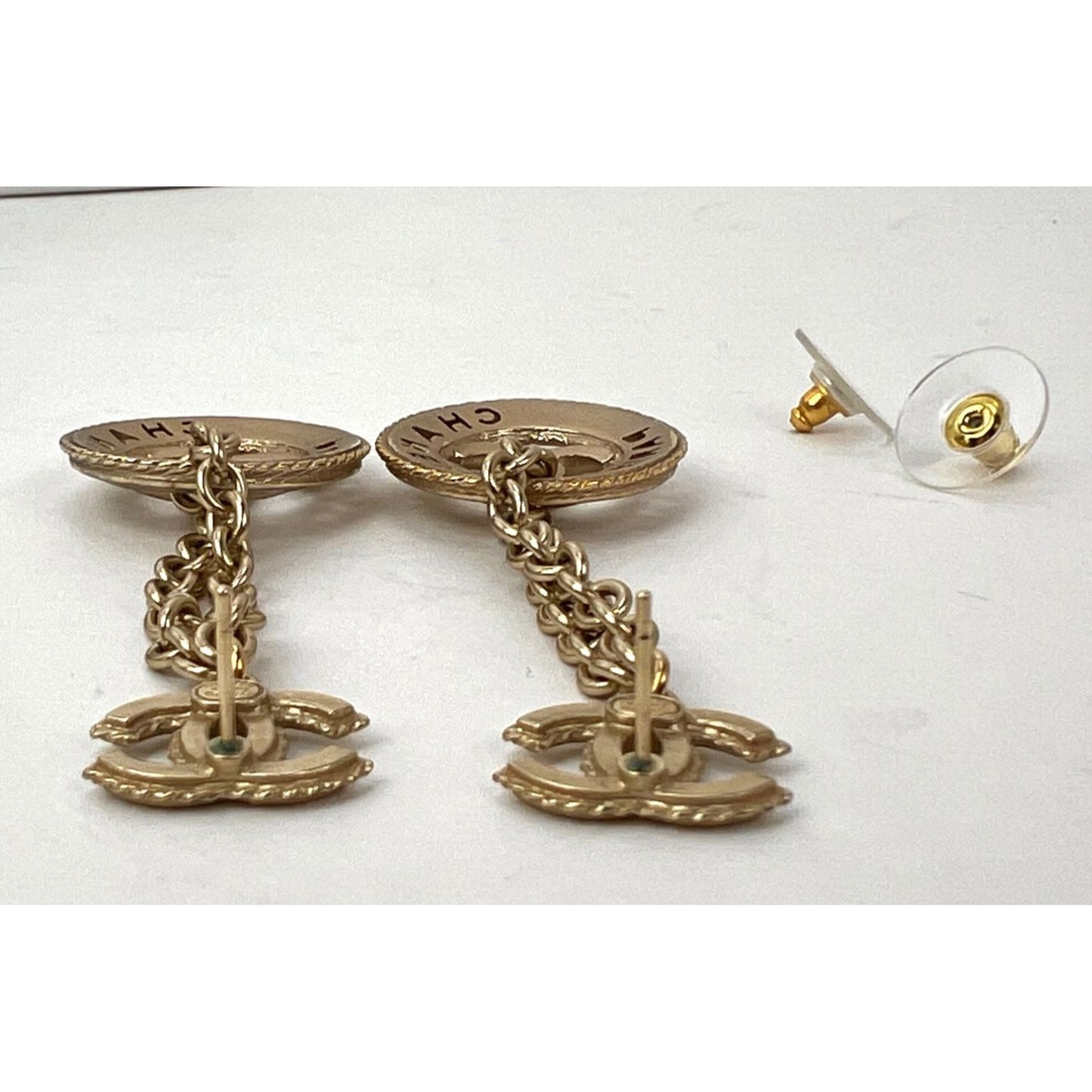 
                  
                    Chanel Gold Chain Logo Dangle CC Earrings
                  
                