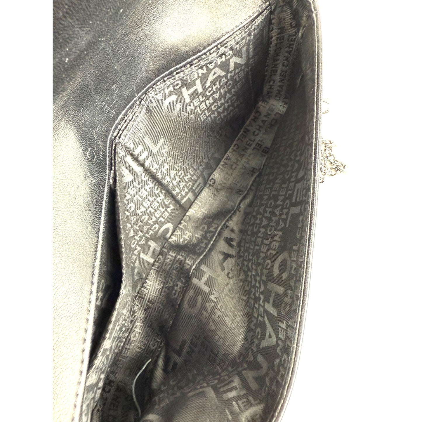 
                  
                    Chanel Lambskin Cruiser Quilted Knot Flap Shoulder Bag
                  
                