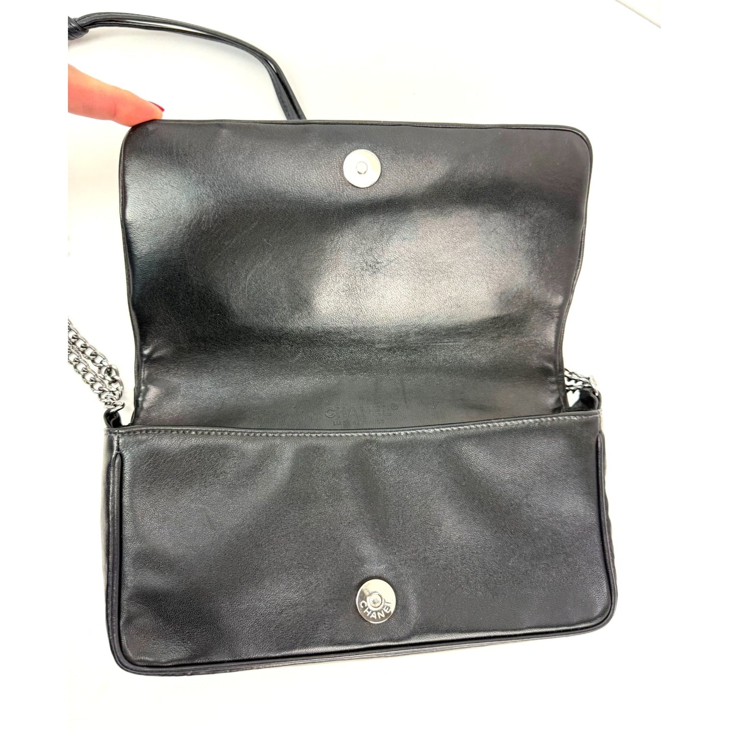 
                  
                    Chanel Lambskin Cruiser Quilted Knot Flap Shoulder Bag
                  
                