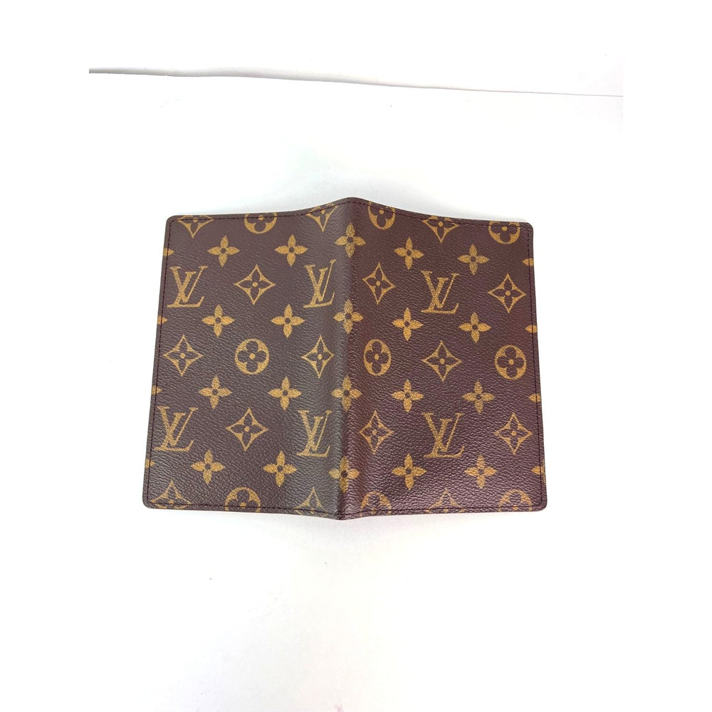 
                  
                    Louis Vuitton Monogram Passport Holder Cover
                  
                