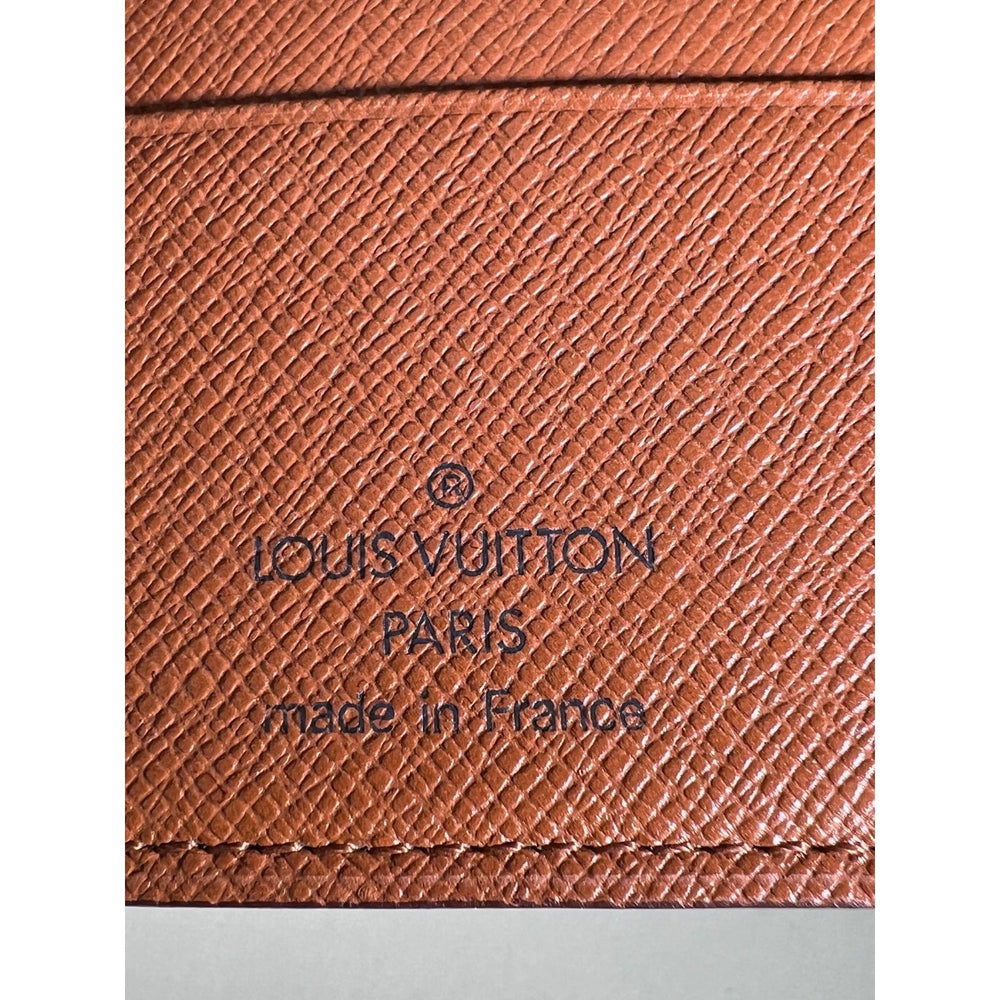 
                  
                    Louis Vuitton Monogram Passport Holder Cover
                  
                