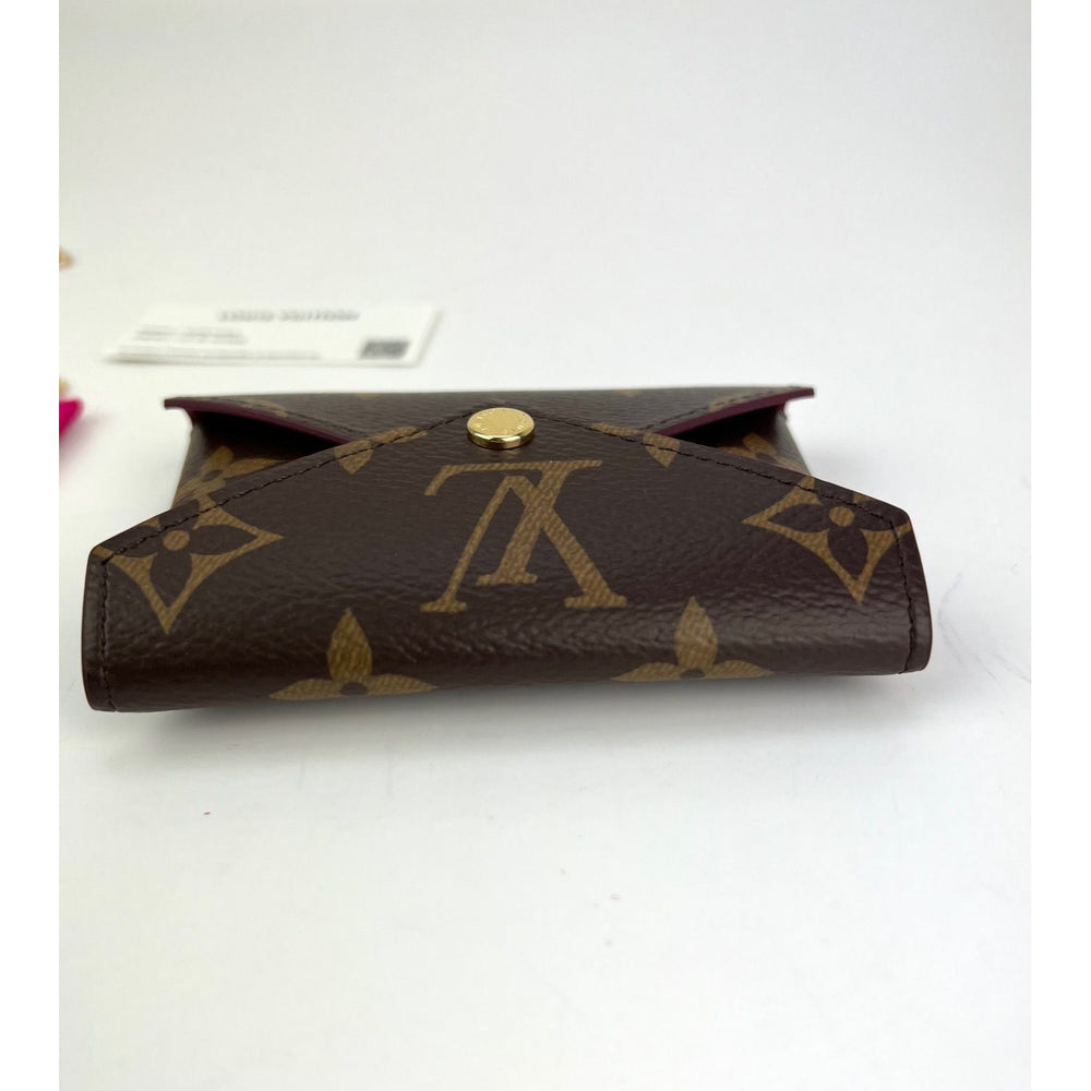 Louis Vuitton Pochette Insert Kirigami Monogram Medium BrownLouis Vuitton  Pochette Insert Kirigami Monogram Medium Brown - OFour