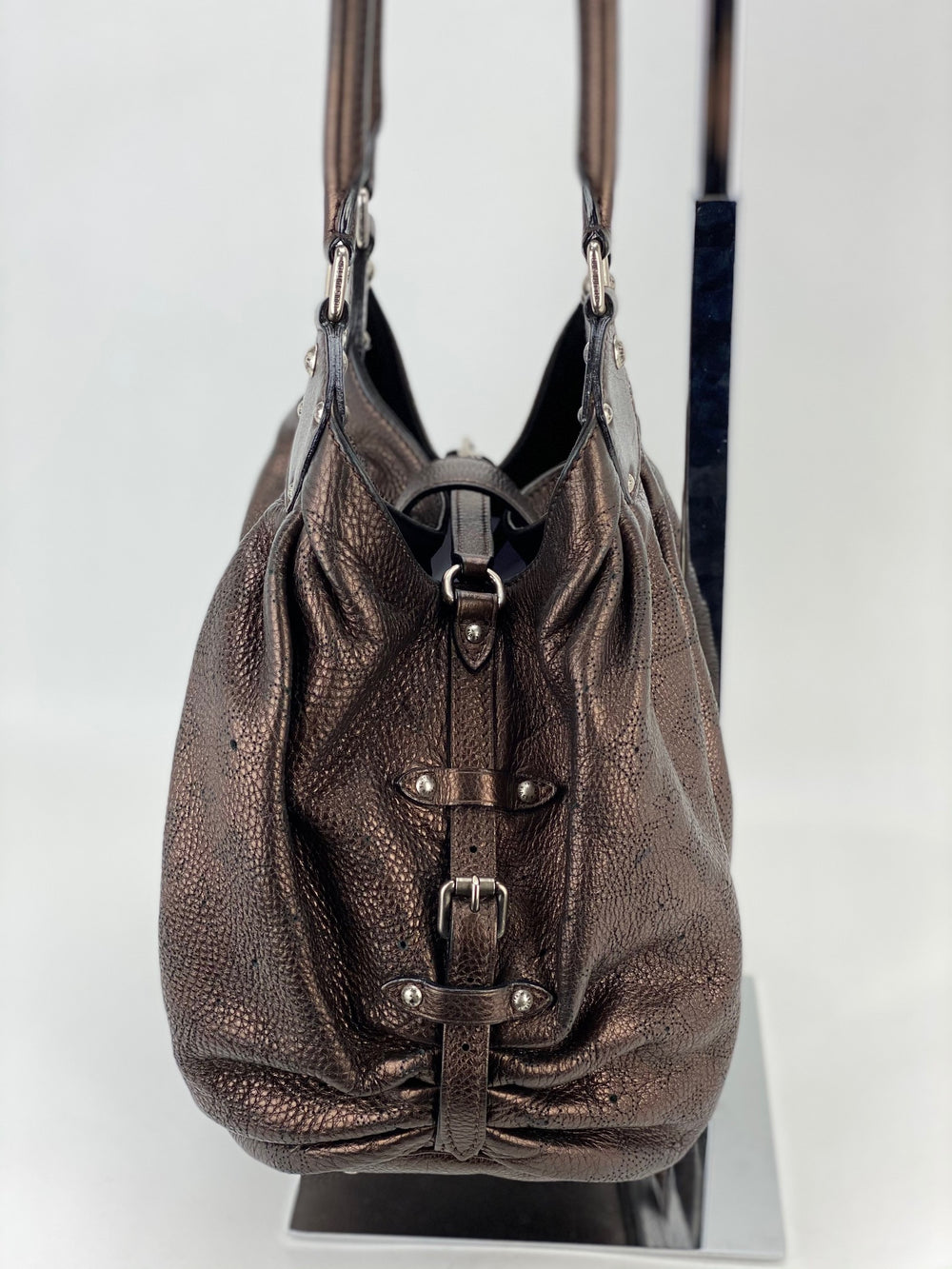 LOUIS VUITTON Mahina model bag in modoré/bronze leat…