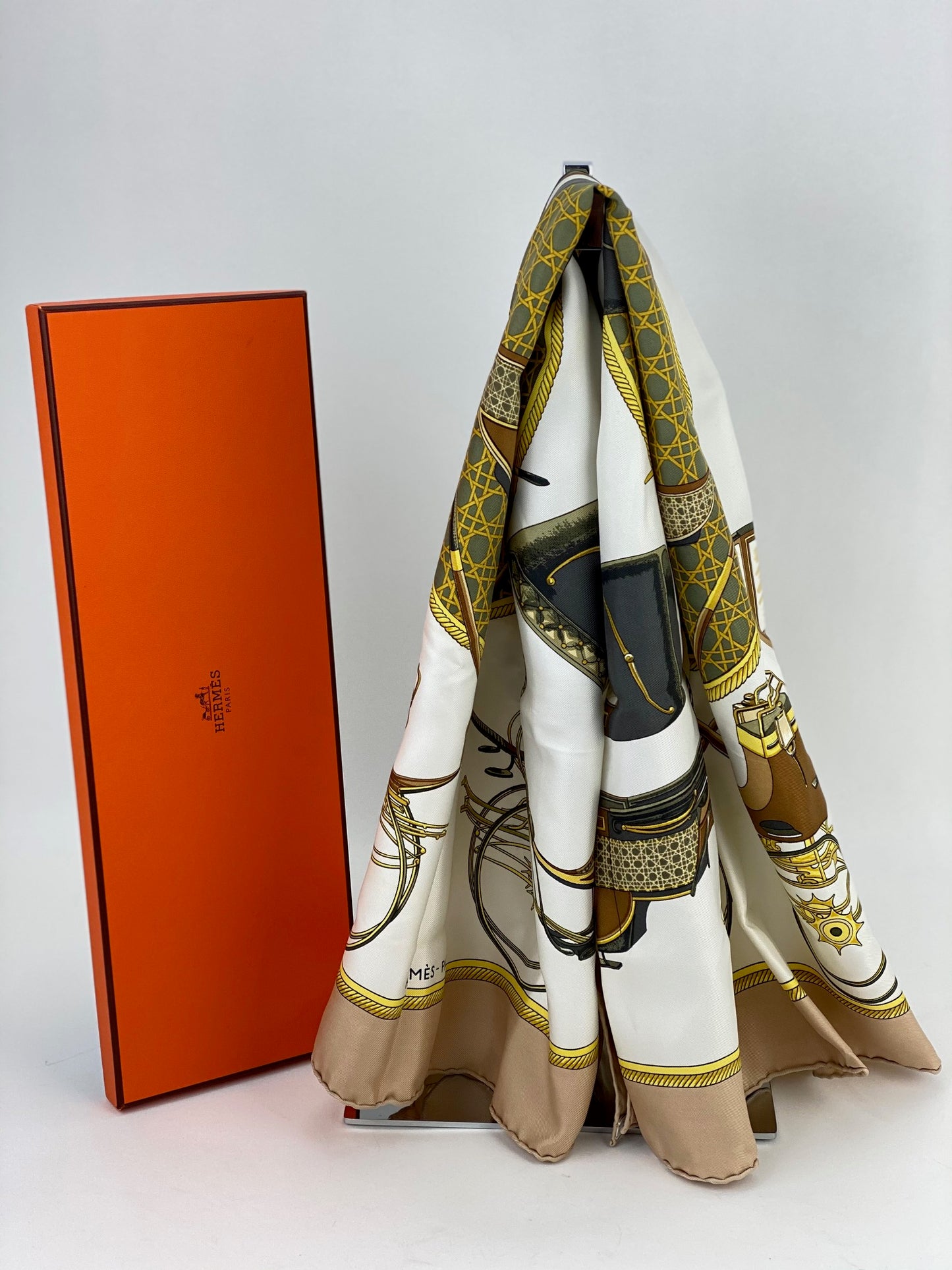 A SILK HERMES SCARF IN THE ORIGINAL BOX, FRANCE, OF RECENT