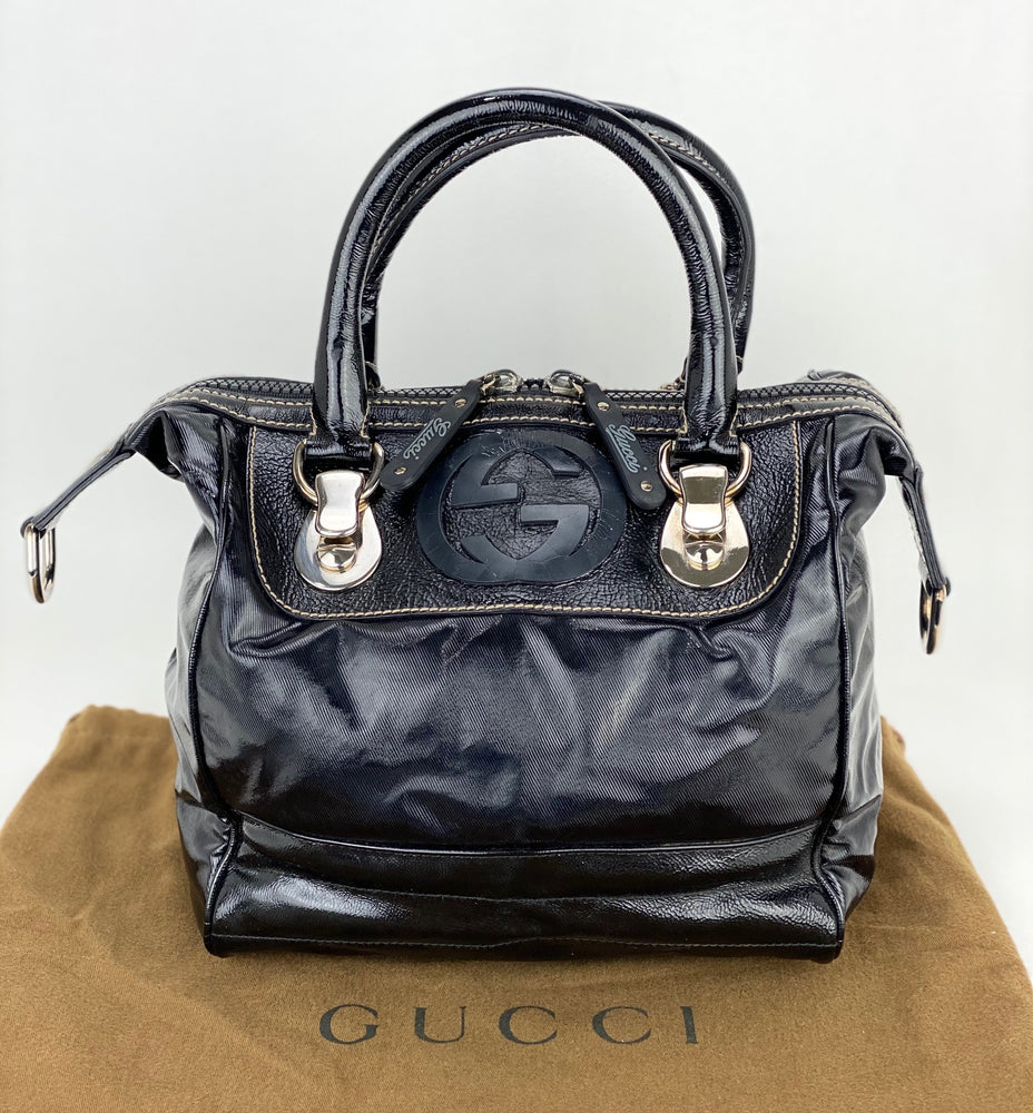 
                  
                    GUCCI Dialux Snow Glam Black Canvas and Leather Boston Shoulder Bag
                  
                