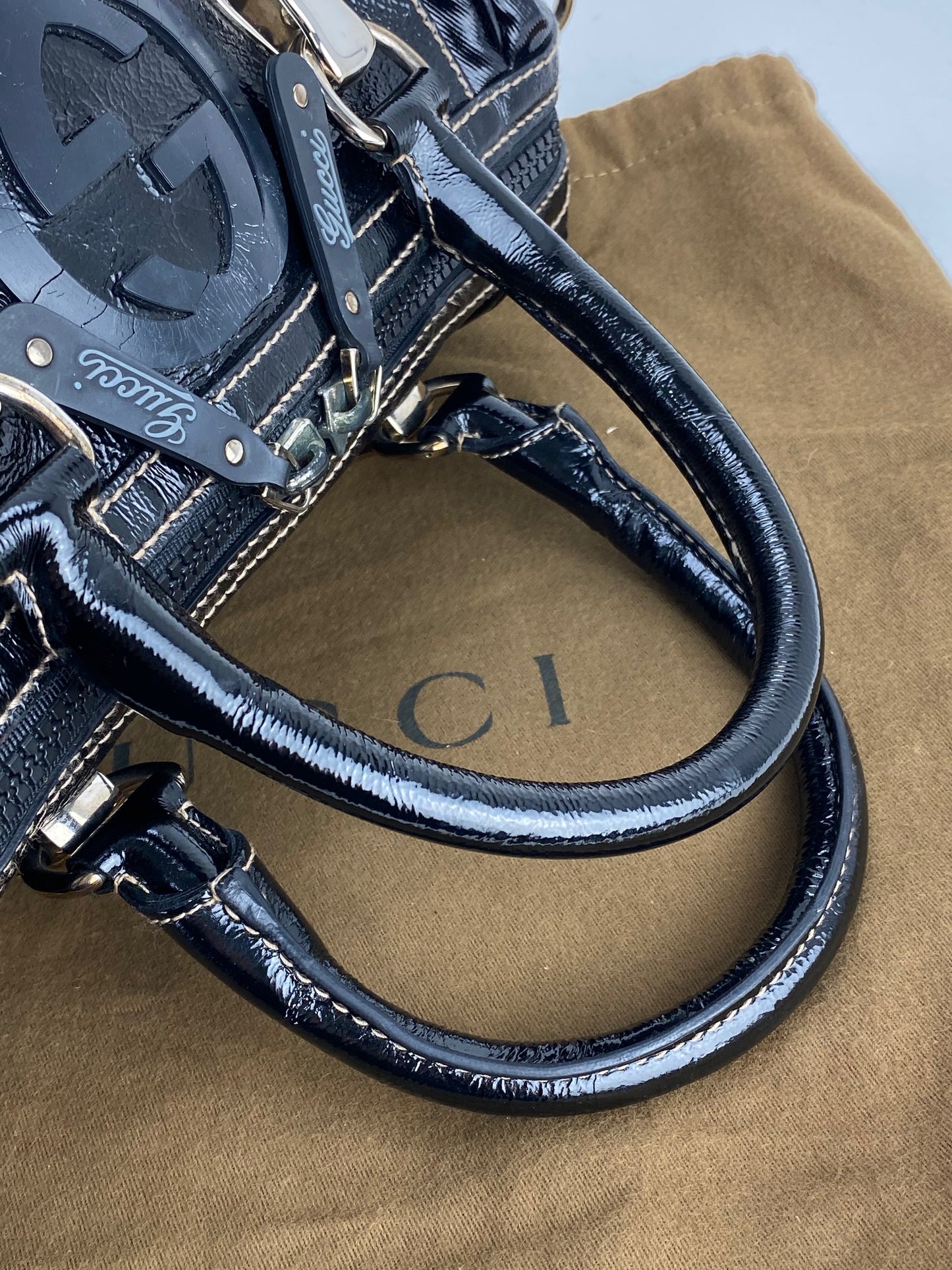 
                  
                    GUCCI Dialux Snow Glam Black Canvas and Leather Boston Shoulder Bag
                  
                