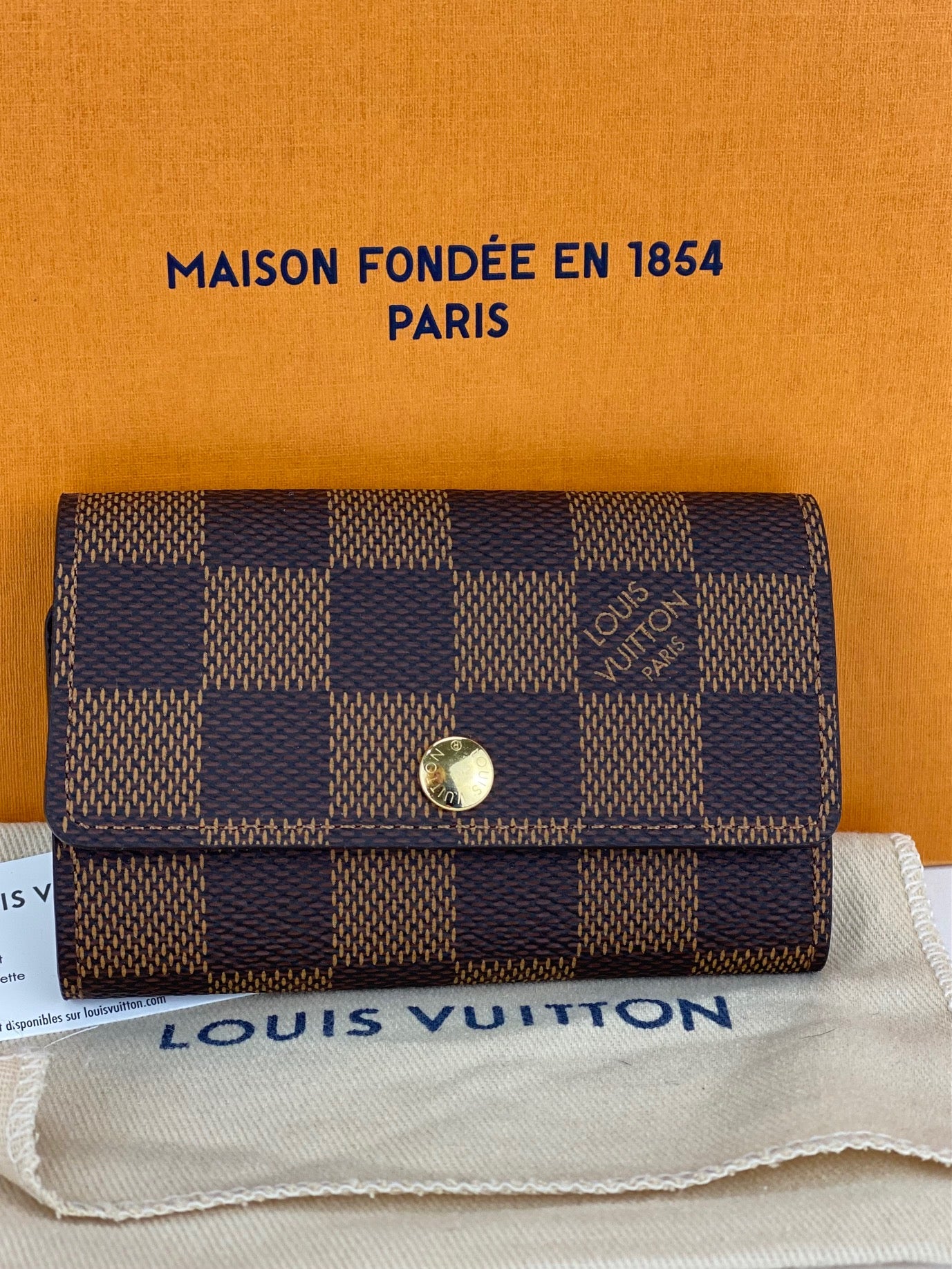 Louis Vuitton Damier Ebene 4 Key holder, Luxury, Bags & Wallets on