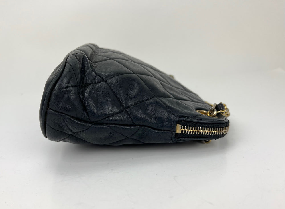 Authentic Chanel 2003 Black Solid Lambskin Leather Bag on sale at JHROP.  Luxury Designer Consignment Resale @jhrop_official