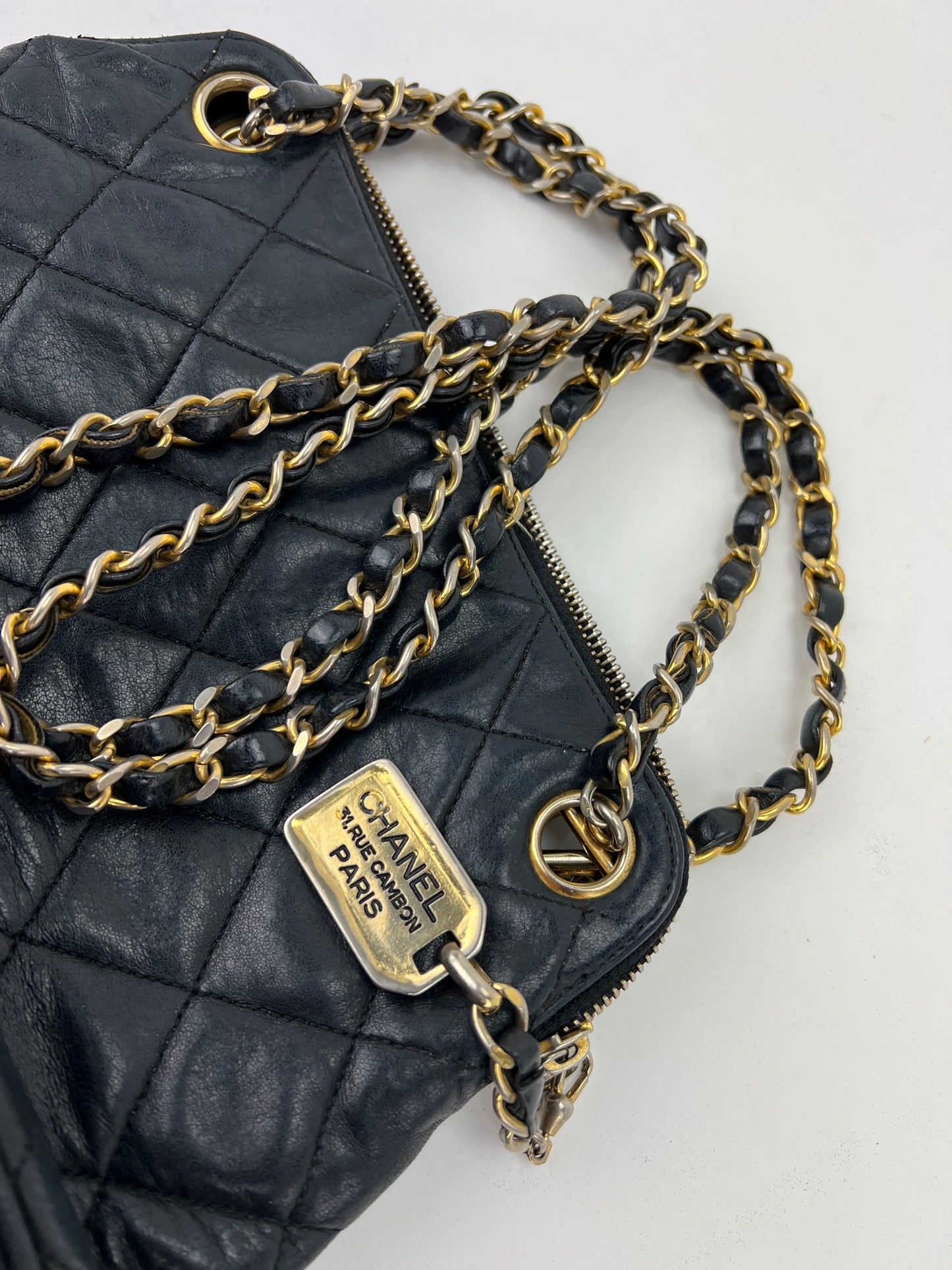 CHANEL VINTAGE FLAP BAG, square quilted leather with brass tone hardware,  chain and leather detachable shoulder strap, matching leather interior,  inside sticker 6692937, 26cm x 13cm H x 4cm.