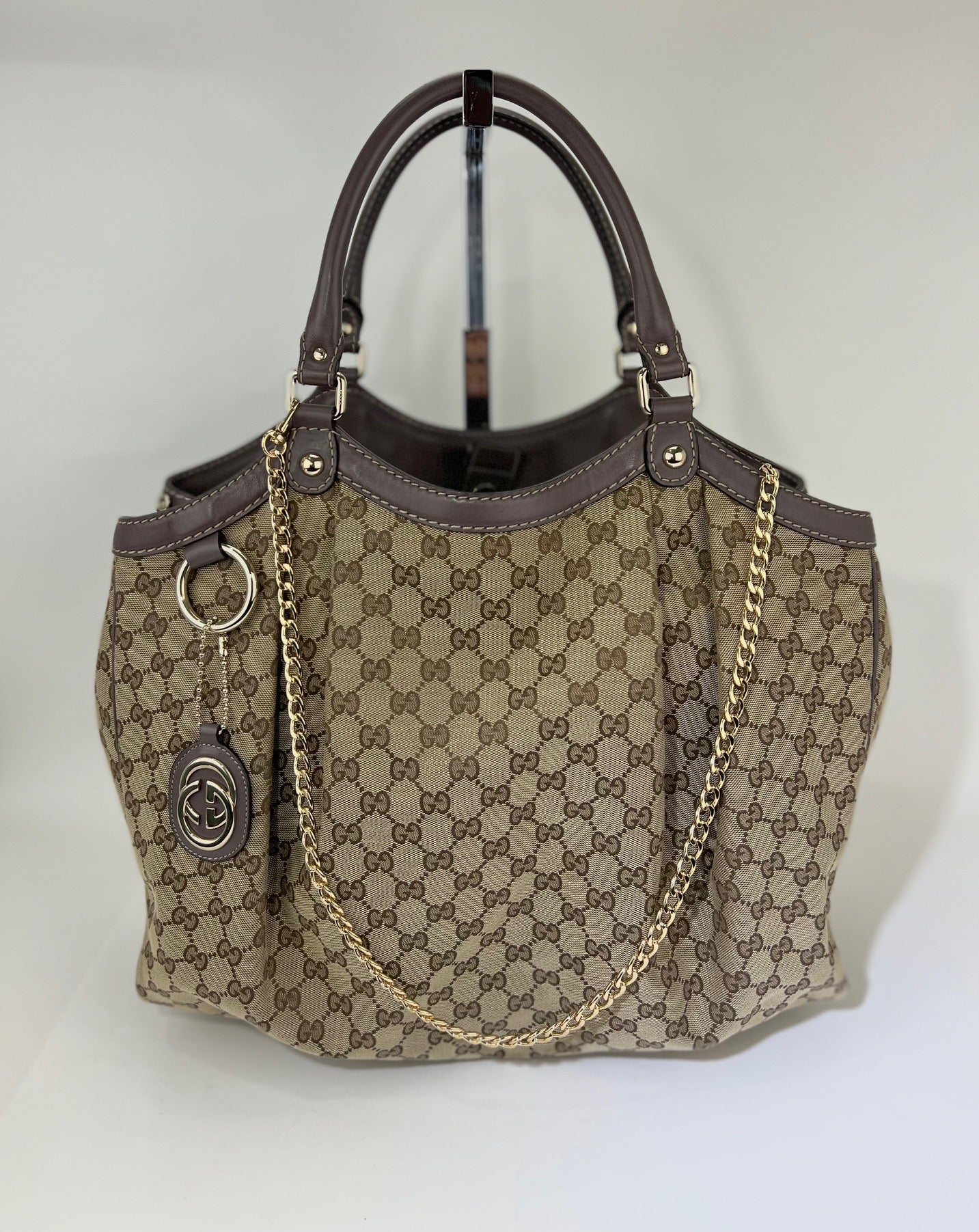 At Auction: Gucci Ivory Woven Leather Sukey Tote Bag