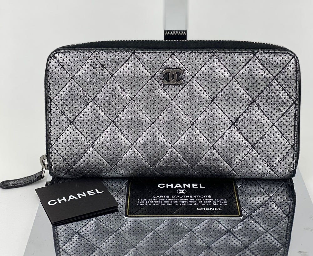 Chanel Perforated Silver Metallic Zip Clutch Preowned – Debsluxurycloset