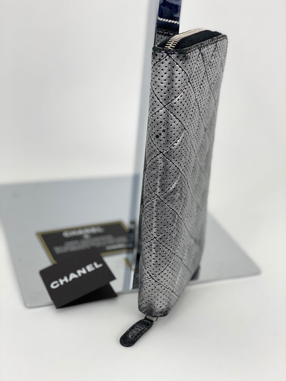 Chanel Perforated Silver Metallic Zip Clutch Preowned